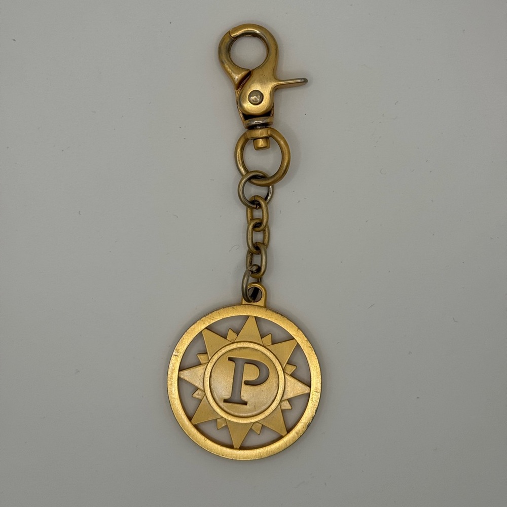 Parazul Gold Keychain with Sunburst Design